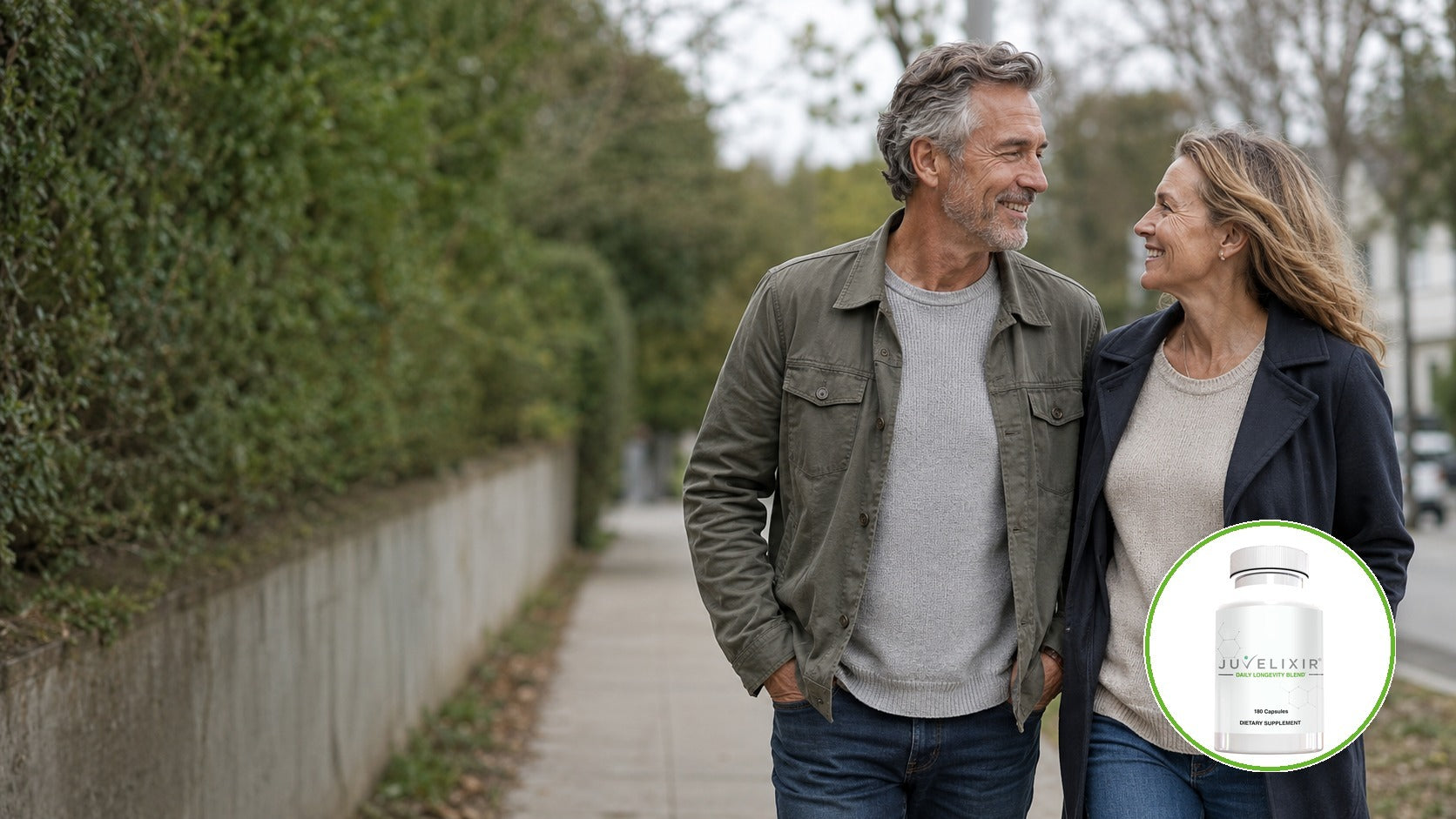 A man and woman in their sixties walking together outdoors, smiling